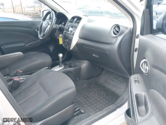 2015 Nissan Versa S Plus with VIN 3N1CN7AP9FL863798, listed as a IAAI auction lot 41738099 with 147,280 mi miles. Bid and sale history available at carsss.com. Image 5.