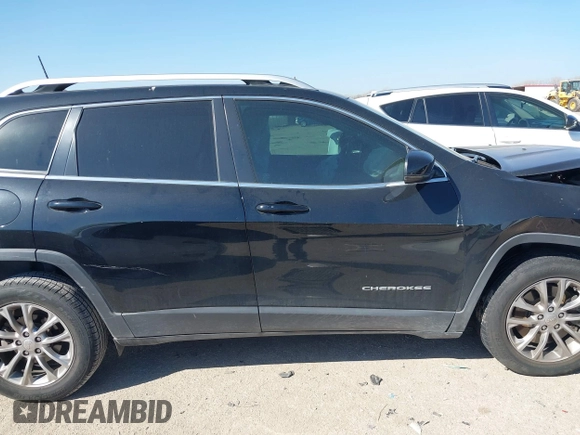 2019 Jeep Cherokee Latitude Plus with VIN 1C4PJLLB4KD312411, listed as a IAAI auction lot 41677041 with 82,802 mi miles and . Bid and sale history available at DreamBid. Image 13.