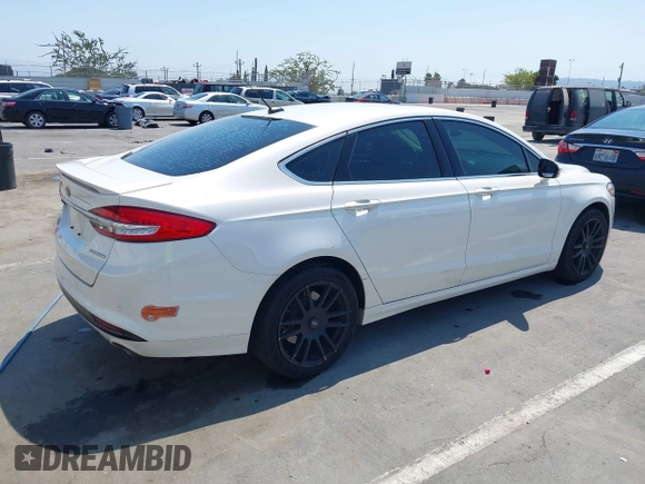 2017 Ford Fusion Titanium with VIN 3FA6P0SU7HR264615, listed as a IAAI auction lot 42747242 with 196,483 mi miles and . Bid and sale history available at DreamBid. Image 4.