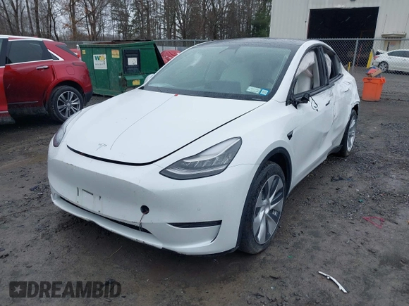2020 Tesla Model Y Long Range with VIN 5YJYGDEE4LF044843, listed as a IAAI auction lot 41799504 with 40,770 mi miles and . Bid and sale history available at DreamBid. Image 6.