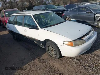 1997 Ford Escort LX with VIN 3FALP15P1VR124828, listed as a IAAI auction lot 42128530 with Not Provided miles and . Bid and sale history available at DreamBid. Image 1.
