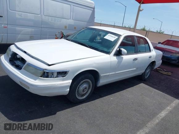 1996 Mercury Grand Marquis GS with VIN 2MELM74WXTX650841, listed as a IAAI auction lot 41936608 with 205,964 mi miles and . Bid and sale history available at DreamBid. Image 12.