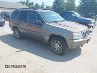 2002 Jeep Grand Cherokee Limited with VIN 1J8GW58N62C213751, listed as a IAAI auction lot 42478869 with 233,848 mi miles and . Bid and sale history available at DreamBid. Image 1.