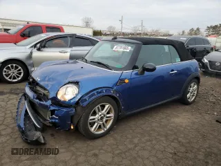 2014 MINI Convertible with VIN WMWZN3C53ET861225, listed as a Copart auction lot 87791665 with 104,151 mi miles and Salvage Title. Bid and sale history available at DreamBid. Image 1.