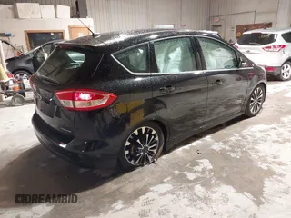 2017 Ford C-Max Titanium z VIN 1FADP5FU4HL101384, wystawiony jako IAAI lot #42308528 z przebiegiem 152 235 mil mil oraz . Historia ofert i sprzedaży dostępna na DreamBid. Obrazek 4.