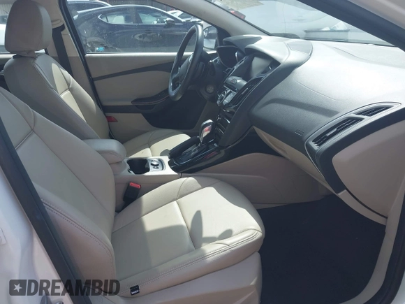 2014 Ford Focus Electric with VIN 1FADP3R49EL355751, listed as a IAAI auction lot 42628237 with 56,551 mi miles and . Bid and sale history available at DreamBid. Image 5.