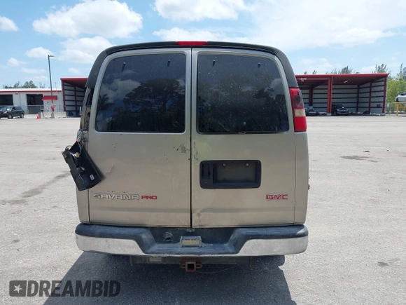 2003 GMC Savana Cargo with VIN 1GTHG35U431146718, listed as a IAAI auction lot 42098826 with 238,502 mi miles. Bid and sale history available at carsss.com. Image 16.