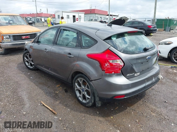 2014 Ford Focus SE with VIN 1FADP3K28EL337377, listed as a IAAI auction lot 41962856 with 137,906 mi miles. Bid and sale history available at carsss.com. Image 3.