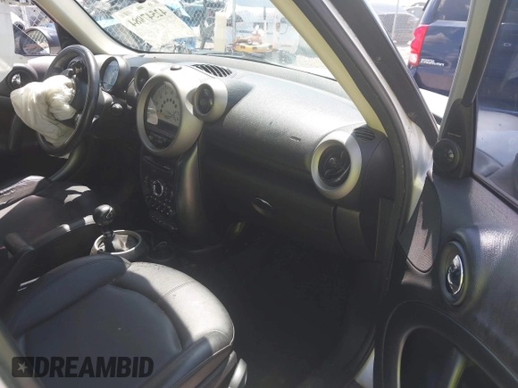 2011 MINI Countryman S with VIN WMWZC5C53BWL53641, listed as a IAAI auction lot 42547084 with 171,647 mi miles and . Bid and sale history available at DreamBid. Image 5.