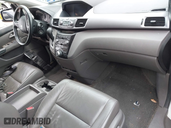 2013 Honda Odyssey Touring with VIN 5FNRL5H96DB074819, listed as a IAAI auction lot 41898358 with 123,428 mi miles and . Bid and sale history available at carsss.com. Image 5.
