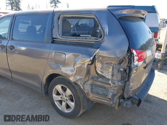 2013 Toyota Sienna L with VIN 5TDZK3DC1DS400675, listed as a IAAI auction lot 42053231 with 85,070 mi miles. Bid and sale history available at carsss.com. Image 6.