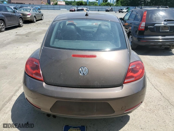 2012 Volkswagen Beetle 2.5L w/Sun PZEV with VIN 3VWJP7AT6CM606385, listed as a Copart auction lot 59566374 with 123,568 mi miles and Salvage Title. Bid and sale history available at carsss.com. Image 6.