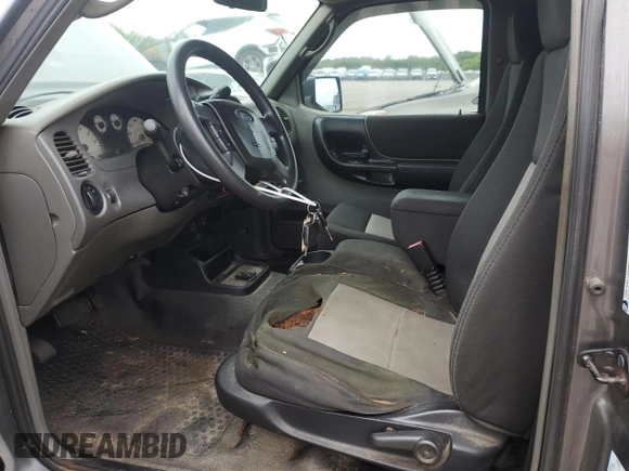2007 Ford Ranger XL z VIN 1FTZR15E77PA46062, wystawiony jako Copart lot #58016395 z przebiegiem 106 402 mil mil oraz Czysty tytuł • Clean title. Historia ofert i sprzedaży dostępna na DreamBid. Obrazek 7.