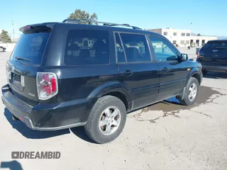 2007 Honda Pilot EX-L with VIN 5FNYF185X7B016807, listed as a IAAI auction lot 41759785 with 129,690 mi miles. Bid and sale history available at carsss.com. Image 4.