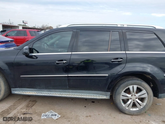2011 Mercedes-Benz GL-Class GL 450 with VIN 4JGBF7BE4BA629312, listed as a IAAI auction lot 41384945 with 127,239 mi miles. Bid and sale history available at carsss.com. Image 14.