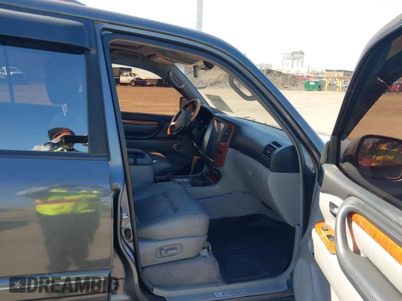 2003 Lexus LX with VIN JTJHT00W033531066, listed as a IAAI auction lot 41969617 with 209,710 mi miles. Bid and sale history available at carsss.com. Image 5.