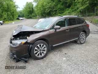 2019 Subaru Outback Touring with VIN 4S4BSETCXK3349766, listed as a Copart auction lot 58706395 with 71,097 mi miles and Salvage title. Bid and sale history available at DreamBid. Image 1.