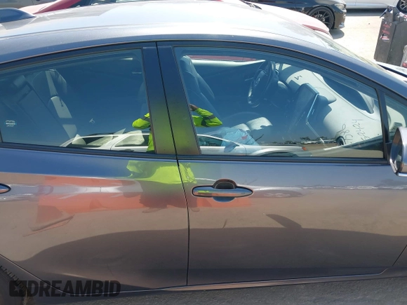 2021 Toyota Prius LE with VIN JTDKAMFP3M3167586, listed as a IAAI auction lot 39672661 with 42,050 mi miles and . Bid and sale history available at DreamBid. Image 13.