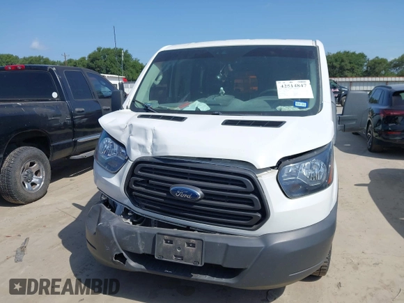 2018 Ford Transit with VIN 1FTYE1ZM0JKA43498, listed as a IAAI auction lot 42514847 with 131,539 mi miles and . Bid and sale history available at DreamBid. Image 12.