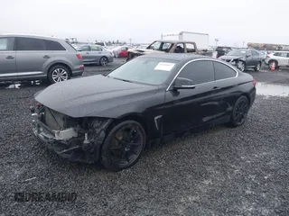 2015 BMW 4 Series 428i xDrive with VIN WBA3N5C56FK197981, listed as a IAAI auction lot 41145927 with 101,944 mi miles and . Bid and sale history available at DreamBid. Image 18.