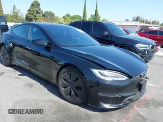 2022 Tesla Model S with VIN 5YJSA1E5XNF467435, listed as a IAAI auction lot 42538706 with 26,504 mi miles and . Bid and sale history available at DreamBid. Image 1.