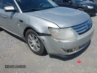2008 Ford Taurus SEL z VIN 1FAHP24W28G186822, wystawiony jako IAAI lot #42173076 z przebiegiem 243 849 mil mil oraz . Historia ofert i sprzedaży dostępna na DreamBid. Obrazek 6.