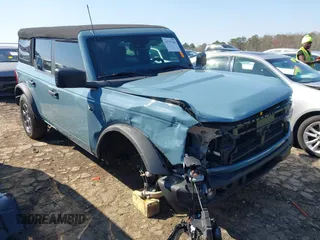 2023 Ford Bronco z VIN 1FMEE5BP4PLA98386, wystawiony jako IAAI lot #41757350 z przebiegiem 18 655 mil mil oraz . Historia ofert i sprzedaży dostępna na DreamBid. Obrazek 1.