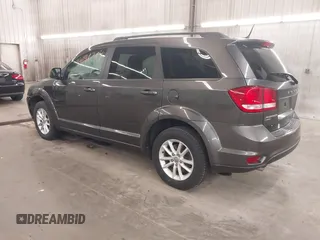 2017 Dodge Journey SXT with VIN 3C4PDDBG1HT512398, listed as a IAAI auction lot 42098784 with 123,946 mi miles and . Bid and sale history available at DreamBid. Image 3.
