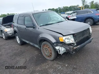 2012 Ford Escape XLS with VIN 1FMCU0C74CKB60736, listed as a IAAI auction lot 42384887 with 97,258 mi miles and . Bid and sale history available at DreamBid. Image 1.