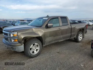 2015 Chevrolet Silverado 1500 LT with VIN 1GCVKREC5FZ177932, listed as a Copart auction lot 67757254 with 166,365 mi miles and Salvage Title. Bid and sale history available at carsss.com. Image 1.