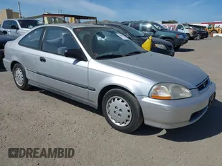 1997 Honda Civic DX with VIN 1HGEJ6220VL106203, listed as a IAAI auction lot 42098813 with 192,343 mi miles. Bid and sale history available at carsss.com. Image 1.