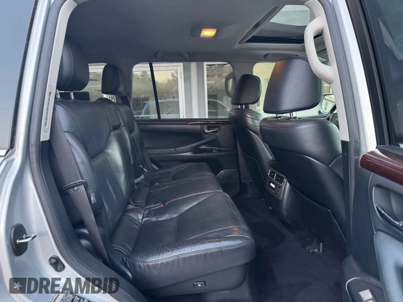 2013 Lexus LX 570 z VIN JTJHY7AX8D4089490, wystawiony jako Copart lot #76832954 z przebiegiem 203 267 mil mil oraz Czysty tytuł • Clean title. Historia ofert i sprzedaży dostępna na DreamBid. Obrazek 6.