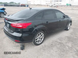 2015 Ford Focus SE with VIN 1FADP3F29FL219561, listed as a IAAI auction lot 42470047 with 98,169 mi miles and . Bid and sale history available at DreamBid. Image 4.