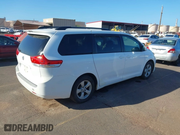 2011 Toyota Sienna LE AAS with VIN 5TDKK3DC3BS086073, listed as a IAAI auction lot 41637136 with 257,615 mi miles. Bid and sale history available at carsss.com. Image 4.