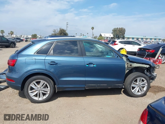 2017 Audi Q3 Premium with VIN WA1ECCFS6HR000870, listed as a IAAI auction lot 42028017 with 103,930 mi miles. Bid and sale history available at carsss.com. Image 14.