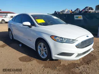 2018 Ford Fusion Hybrid S with VIN 3FA6P0UU0JR204324, listed as a IAAI auction lot 41312303 with 100,527 mi miles. Bid and sale history available at carsss.com. Image 1.
