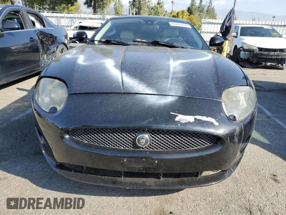 2008 Jaguar XK with VIN SAJWA43B985B23651, listed as a Copart auction lot 54621835 with 145,429 mi miles and Clean Title. Bid and sale history available at DreamBid. Image 5.