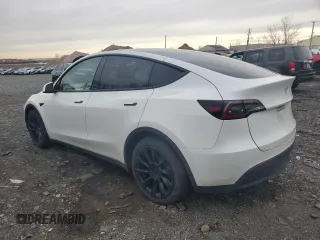 2023 Tesla Model Y Long Range with VIN 7SAYGDEE0PF746778, listed as a Copart auction lot 52704965 with 19,047 mi miles and Salvage Title. Bid and sale history available at DreamBid. Image 2.