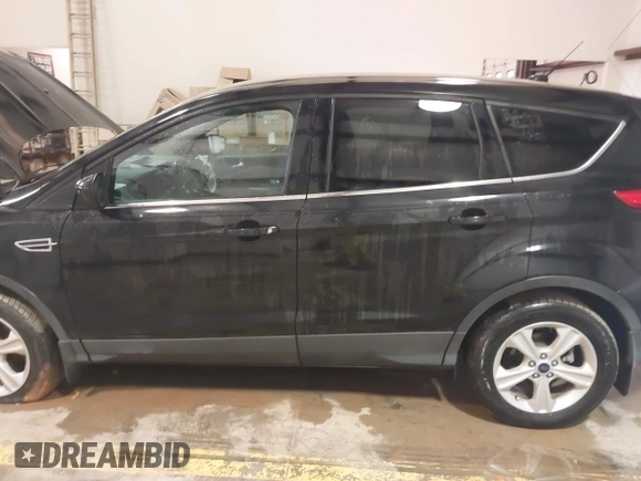2014 Ford Escape SE z VIN 1FMCU9GX6EUB69007, wystawiony jako IAAI lot #41710065 z przebiegiem 113 080 mil mil oraz . Historia ofert i sprzedaży dostępna na DreamBid. Obrazek 13.