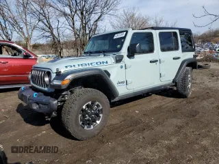 2024 Jeep Wrangler Rubicon z VIN 1C4RJXR61RW255979, wystawiony jako Copart lot #43451095 z przebiegiem 7 258 mil mil oraz Szkoda całkowita • Salvage title. Historia ofert i sprzedaży dostępna na DreamBid. Obrazek 1.