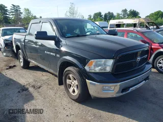 2012 Ram 1500 Outdoorsman z VIN 1C6RD7LT2CS297332, wystawiony jako IAAI lot #42354696 z przebiegiem 168 481 mil mil oraz . Historia ofert i sprzedaży dostępna na DreamBid. Obrazek 1.