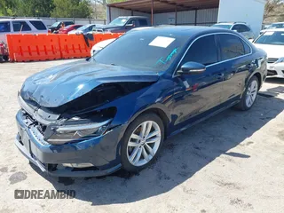 2018 Volkswagen Passat SE z VIN 1VWBA7A37JC033694, wystawiony jako IAAI lot #41977518 z przebiegiem 142 944 mil mil oraz . Historia ofert i sprzedaży dostępna na DreamBid. Obrazek 17.