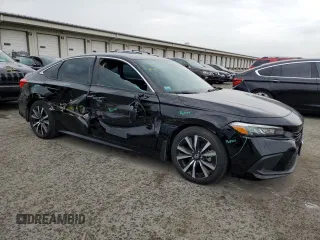 2023 Honda Civic Sedan EX with VIN 2HGFE1F76PH303393, listed as a Copart auction lot 71535614 with 18,539 mi miles and Salvage Title. Bid and sale history available at carsss.com. Image 4.