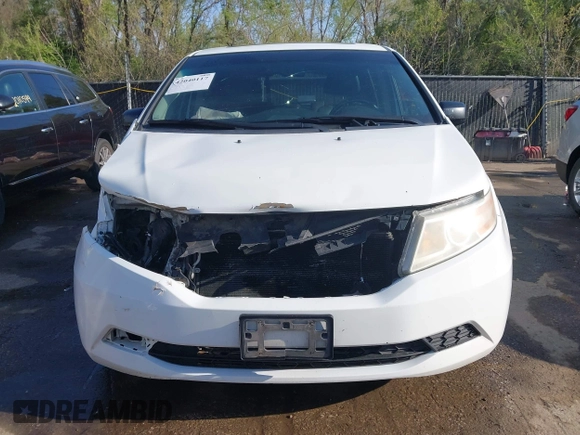 2012 Honda Odyssey EX-L with VIN 5FNRL5H62CB010054, listed as a IAAI auction lot 42040117 with 189,566 mi miles and . Bid and sale history available at carsss.com. Image 13.