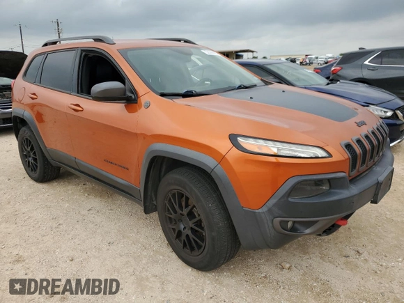 2015 Jeep Cherokee Trailhawk with VIN 1C4PJMBSXFW757382, listed as a Copart auction lot 53566885 with 139,972 mi miles and Clean Title. Bid and sale history available at carsss.com. Image 4.