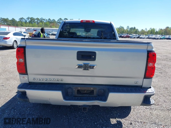 2018 Chevrolet Silverado 1500 LT with VIN 1GCVKREC9JZ335603, listed as a IAAI auction lot 41853399 with 152,460 mi miles and . Bid and sale history available at DreamBid. Image 16.