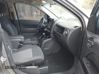 2011 Jeep Compass Latitude with VIN 1J4NF1FB5BD264825, listed as a IAAI auction lot 41935691 with 166,184 mi miles. Bid and sale history available at carsss.com. Image 5.