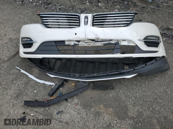 2015 Lincoln MKC z VIN 5LMTJ2AHXFUJ41226, wystawiony jako Copart lot #53430915 z przebiegiem 79 737 mil mil oraz Szkoda całkowita • Salvage title. Historia ofert i sprzedaży dostępna na DreamBid. Obrazek 13.