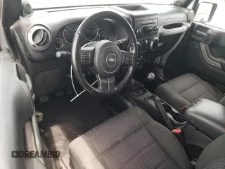 2012 Jeep Wrangler Sport z VIN 1C4AJWAG4CL185009, wystawiony jako Copart lot #61203395 z przebiegiem 93 534 mil mil oraz Szkoda całkowita • Salvage title. Historia ofert i sprzedaży dostępna na DreamBid. Obrazek 8.