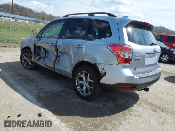 2016 Subaru Forester 2.5i Touring with VIN JF2SJAVC8GH493549, listed as a IAAI auction lot 41875775 with 74,767 mi miles. Bid and sale history available at carsss.com. Image 3.